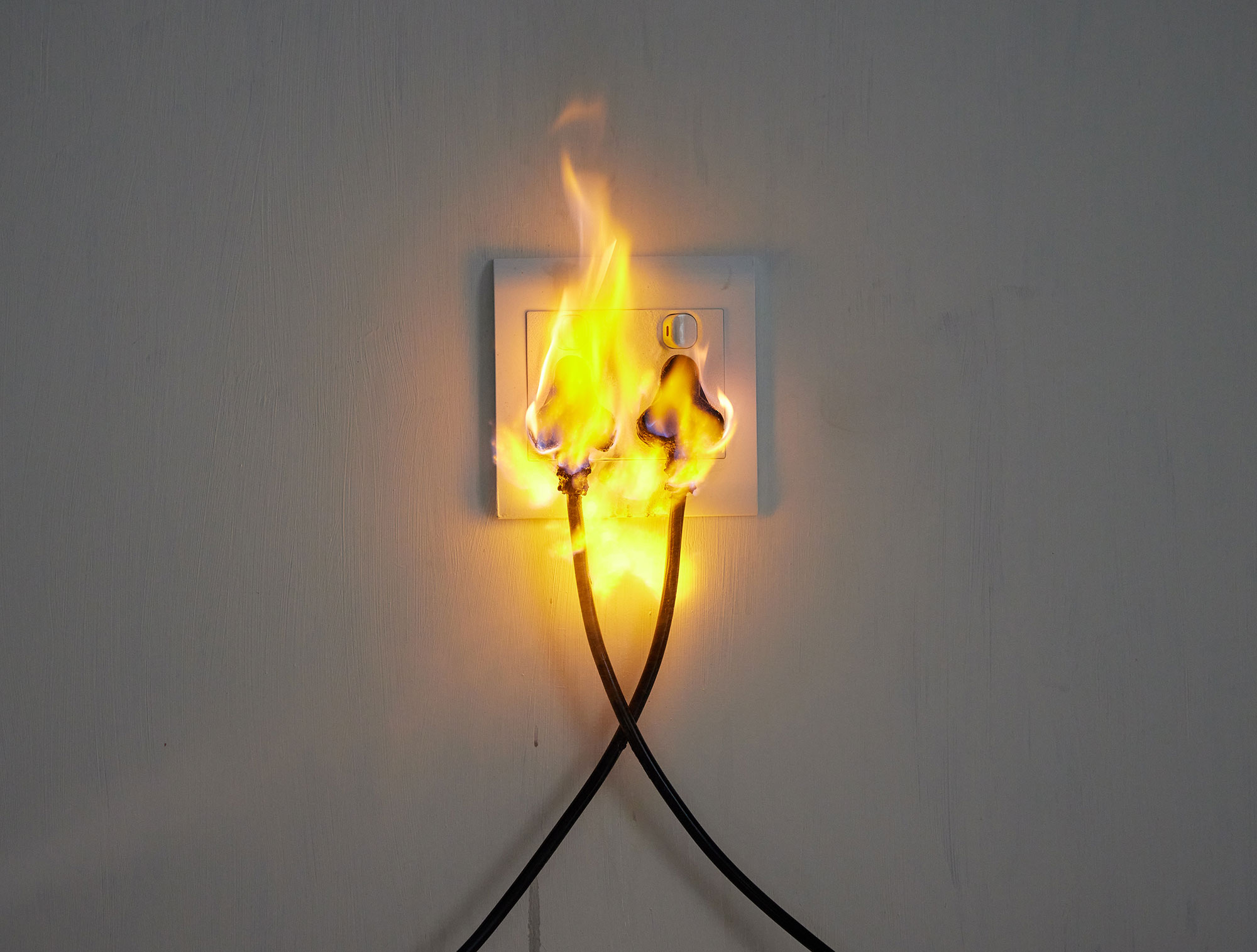 Burning Plug On Wall Outlet