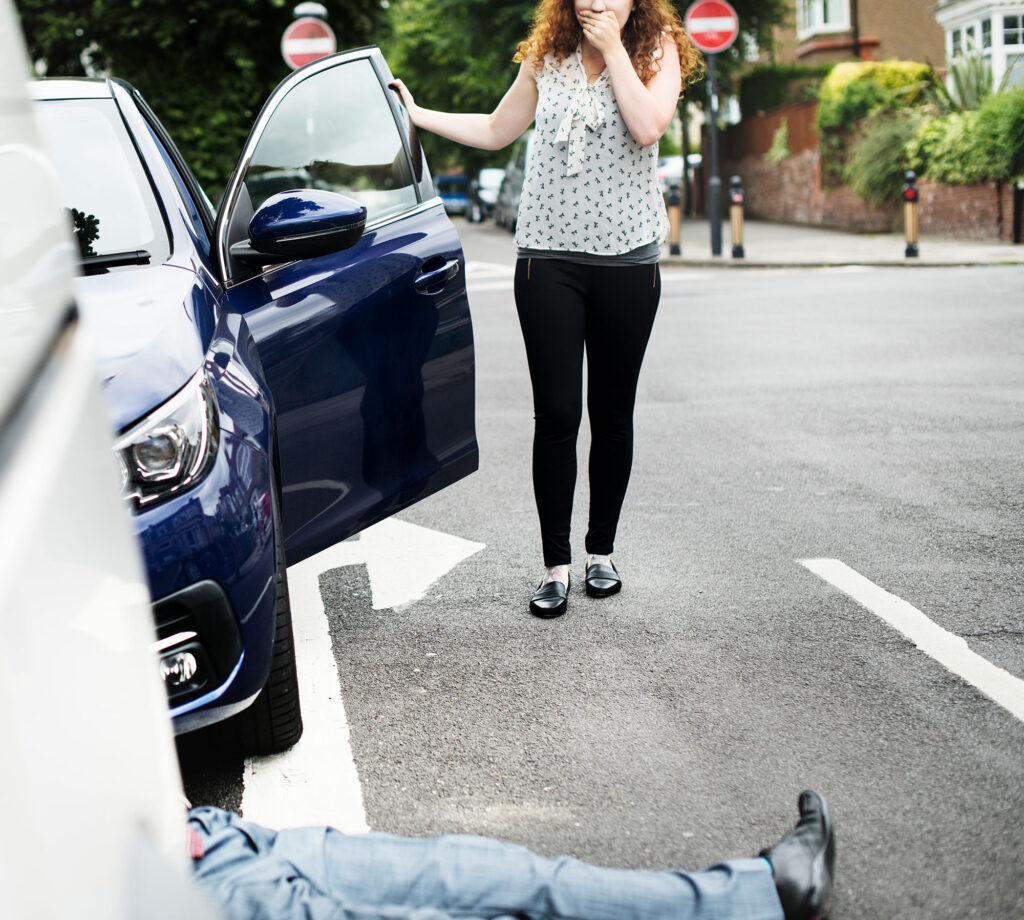 Person Lying On The Ground After A Pedestrian Accident